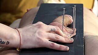 Balls Nait To A Board And Then A Massager On Top This Bitch Comes Hard On Cbt